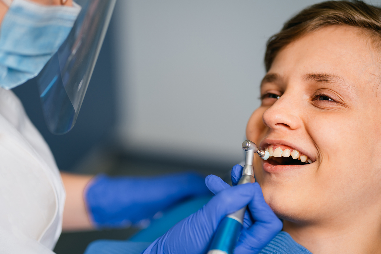 A child getting a preventive fissure sealant treatment at Morrin Dental Newcastle.